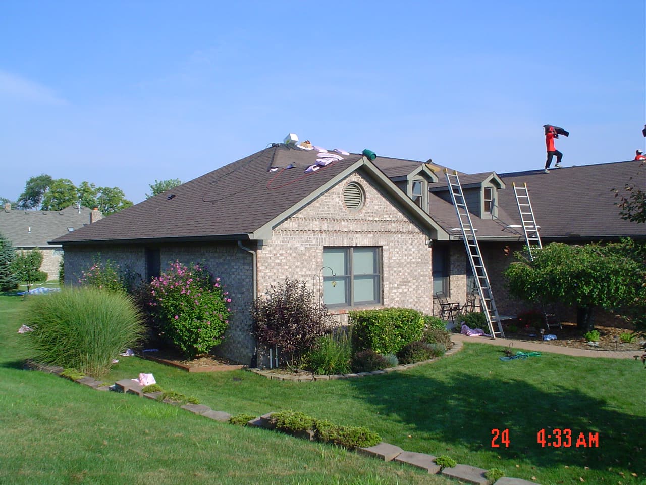 Bolton - Protecting The Gutters During Shingle Removal